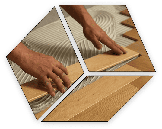 A Man installing Parquet flooring in bedroom
