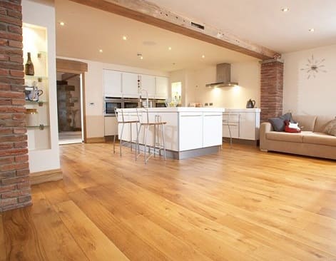 Open plan kitchen living wooden flooring interior