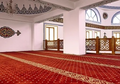 Red Islamic mosque prayer carpet, Abu Dhabi