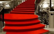 Red carpet on stairs in Abu Dhabi home