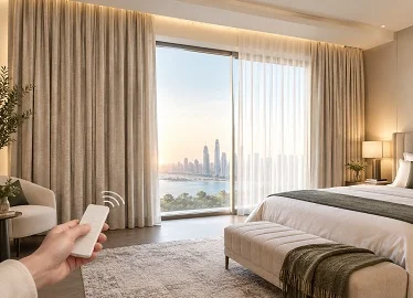 Remote-controlled sheer and beige curtains in luxury bedroom