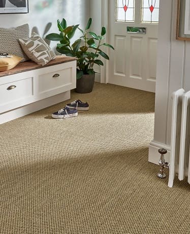 Sisal basketweave carpet installed in cozy entryway