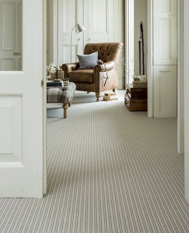 Striped wall to wall carpet hallway Abu Dhabi