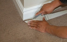 Wall to wall carpet edge cutting installation Abu Dhabi