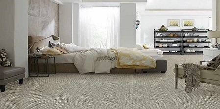 Wall to wall carpet is installed in Abu Dhabi bedroom