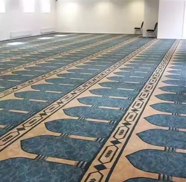 Wall-to-wall mosque carpet installed in prayer hall