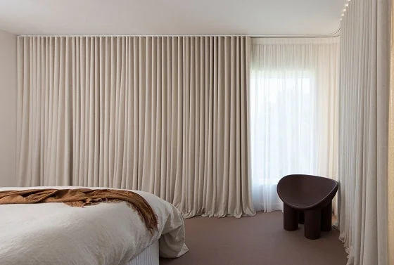 Wave-fold blackout curtains, soft neutral bedroom Abu Dhabi