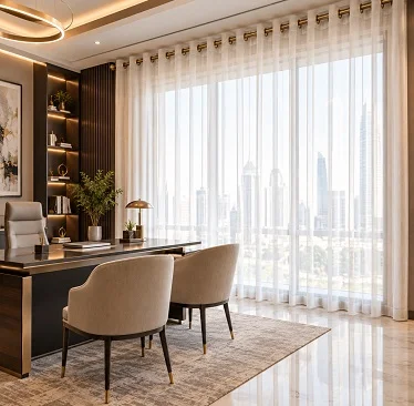 Sheer voile curtains beside a desk overlooking the city